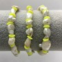 Bracelet with white baroque freshwater pearls, diameter about 9–13×7 mm, with polymer clay rondelle inserts 6×1 mm, length 18 cm, stretch