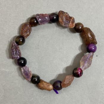 Bracelet with raw amethyst stone, 15x10mm +-, 'Cat's Eye' bead 8mm +-, 18 cm stretch
