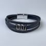 Men's eco-leather bracelet in black with metal inserts, thickness 12-20 mm, length 22 cm, silver metal on clasp