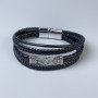 Men's eco-leather bracelet in black with metal inserts, thickness 12-25 mm, length 22 cm, silver-tone metal on the clasp