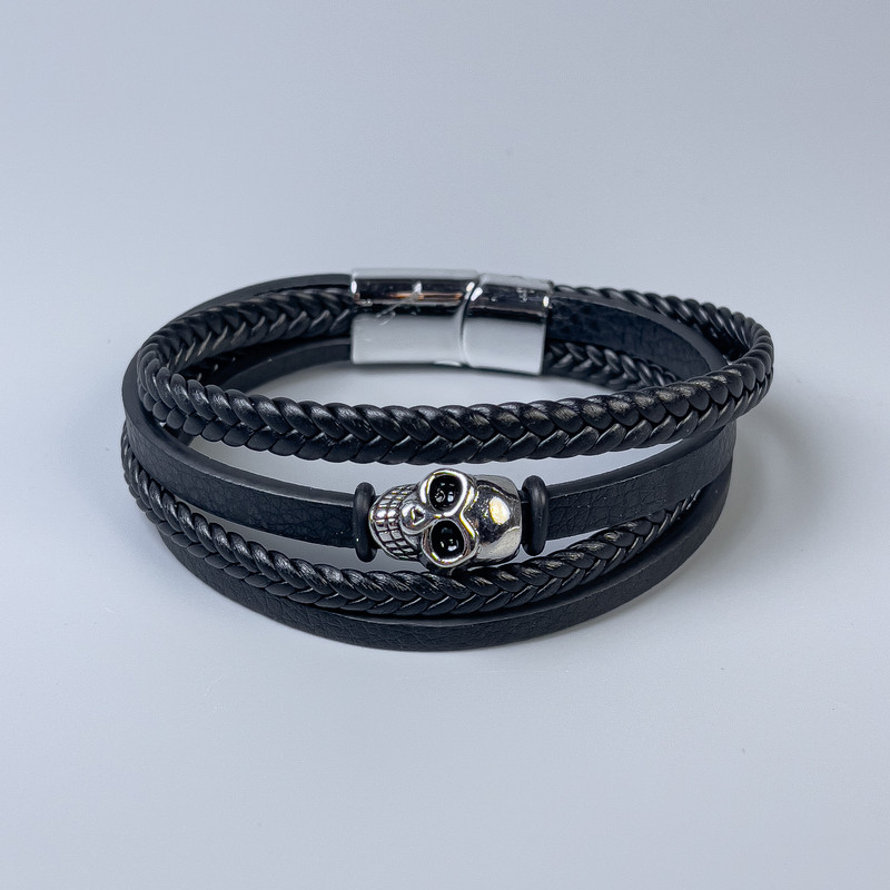 Men's eco-leather bracelet in black with metal inserts, thickness 12-20 mm, length 22 cm, silver metal on the clasp