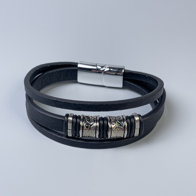 Men's eco-leather bracelet in black with metal inlays, thickness 10 mm +/-, length 22 cm +/-, silver-toned metal on the clasp