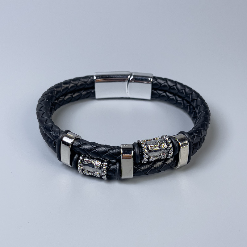 Men's eco-leather bracelet in black with metal inserts, approximately 12 mm thick, 22 cm long, silver-toned metal on the clasp