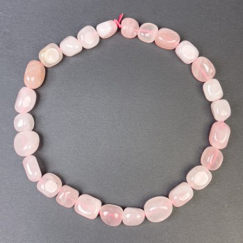 Rose quartz beads, faceted 14–19×13 mm on thread, length 38 cm+