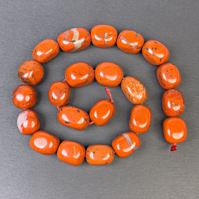 Red Jasper Faceted Beads 18x13 mm on thread, length 38 cm ±
