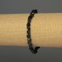 Bracelet with faceted iolite diamond-shaped beads, diameter 6x5 mm, length 18 mm, stretch band