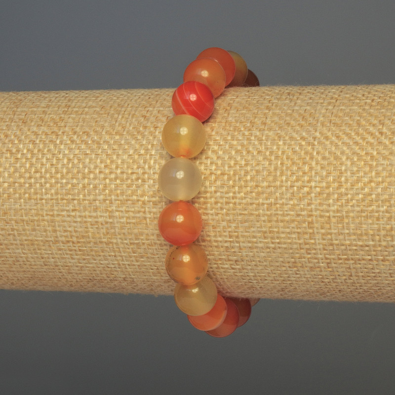 Carnelian bracelet with smooth beads, 10mm diameter ±, 18mm length ±, elastic