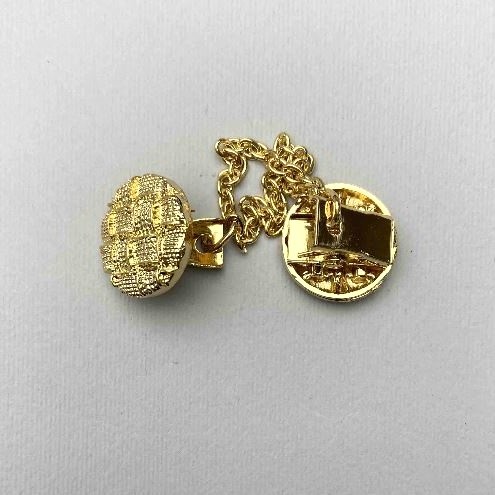 Gold-toned cardigan brooch, 20 mm diameter, chain length about 9 cm