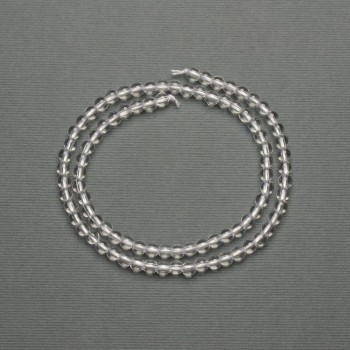 Rock crystal beads, smooth ball-shaped, diameter 4–5 mm, on a thread, length 39 cm+