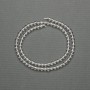 Rock crystal beads, smooth ball-shaped, diameter 4–5 mm, on a thread, length 39 cm+