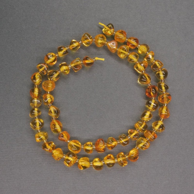 Amber Beads, Faceted, 6–7 mm diameter ±, seed beads 2 mm diameter ±, length 39 cm ±