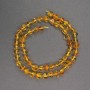 Amber Beads, Faceted, 6–7 mm diameter ±, seed beads 2 mm diameter ±, length 39 cm ±