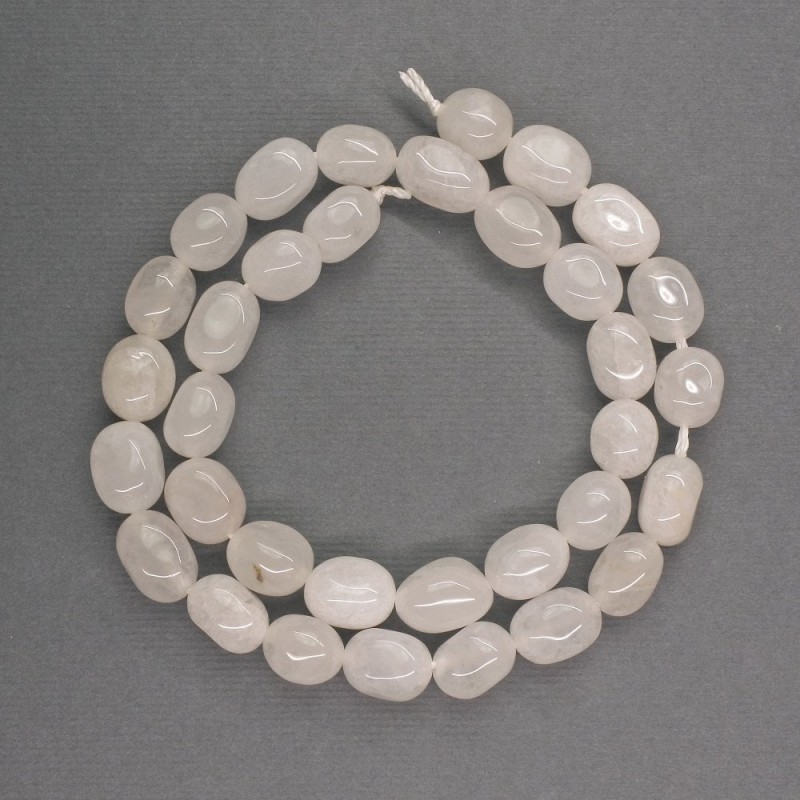 Beads of Natural Stone: White Quartz, Faceted, 8×11 mm, 35 cm length