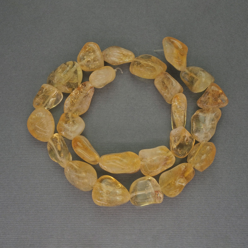 Citrine teardrop-cut beads, diameter 14–18×13–17 mm, on thread, length 38 cm