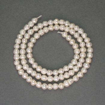 Freshwater white pearls on a thread, diameter 4×3.5 mm, length 36 cm