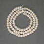 Freshwater white pearls on a strand, diameter 4–5 mm, length 36 cm