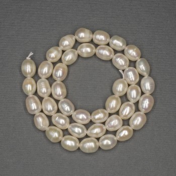 Freshwater White Oval Pearls on a Thread, Diameter 9x7 mm, Length 36 cm
