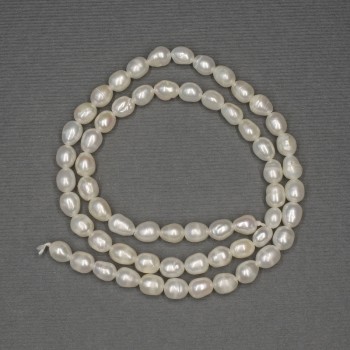 River white oval pearls on a thread, diameter 6 x 4.5-5 mm, length 36 cm+