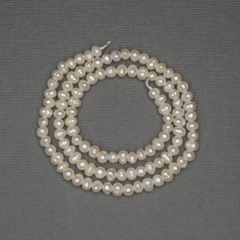 Freshwater white oval pearls on a thread, diameter 4×3 mm, length about 35 cm