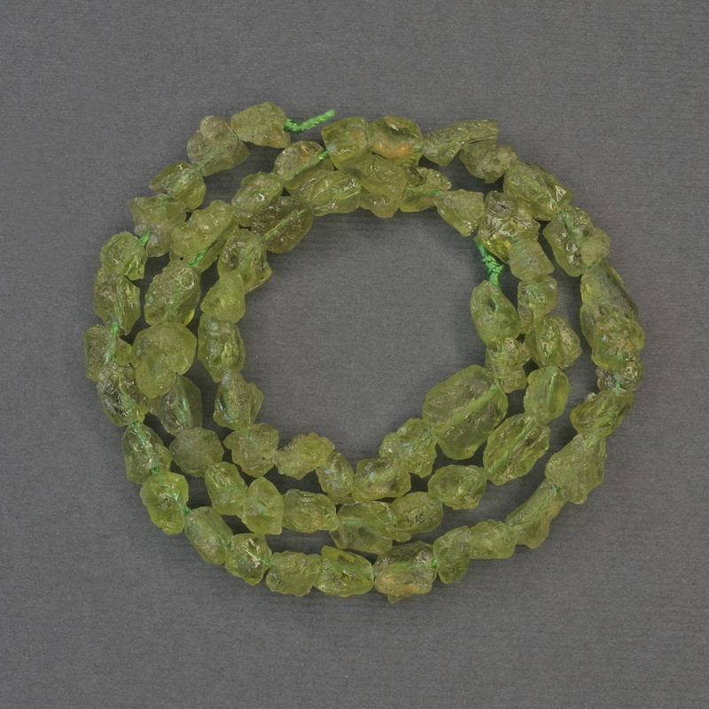 Chrysolite Beads, Unpolished Stone, Drop-Shaped, 6-9×5 mm, on a Thread, Length 38 cm+