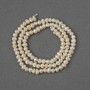 Natural freshwater pearl beads 3×4–4.5 mm, length 34 cm on a thread