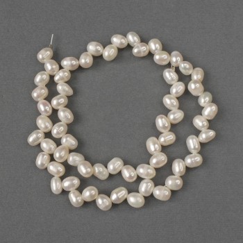 Oval natural freshwater pearl beads 8x6 mm, 38 cm long on a thread