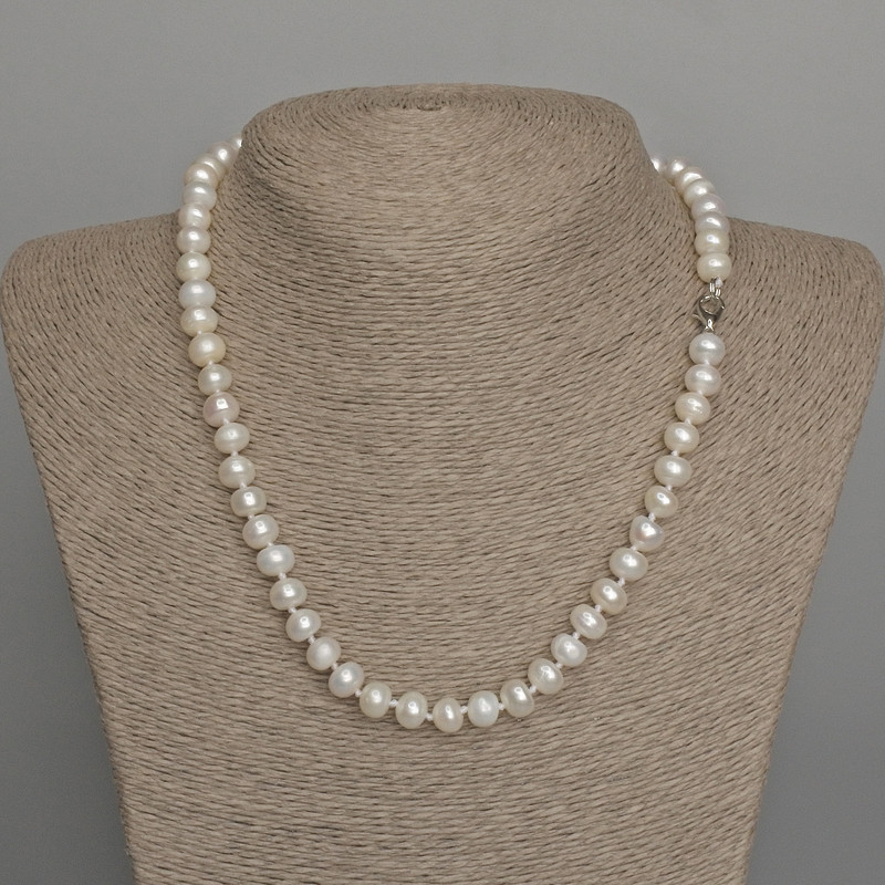 Necklace of natural freshwater pearls 8x7 mm, length 46 cm, with a clasp