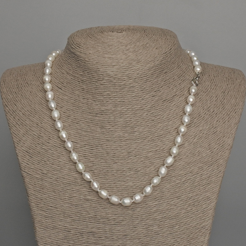 Necklace of natural freshwater pearls, oval, diameter 8×6 mm, length 46 cm ±, with a clasp