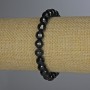 Agate bracelet with a faceted bead, 8 mm diameter ±, 18 mm length ±, stretch