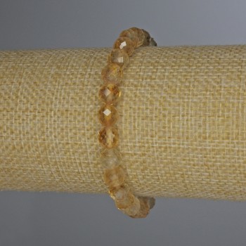 Citrine bracelet with a faceted bead, diameter 7 mm ±, length 18 mm ±, stretch