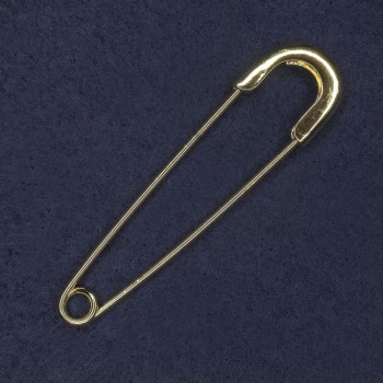 Gold-colored metal brooch-pin 20×77 mm