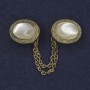 Cardigan brooch with white Cat's Eye oval stone, 26×20 mm diameter, gold-tone metal chain, length approx. 9 cm