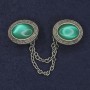 Cardigan brooch with green Cat's Eye oval stone, 26×20 mm diameter, silver-toned metal chain, 9 cm length