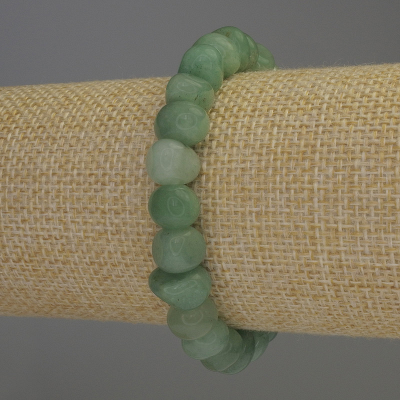 Jade Faceted Bead Bracelet, diameter 10x7 mm ±, length 18 mm ±, stretch