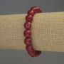 Faceted coral bead bracelet, approximately 10 mm diameter, 18 cm stretch
