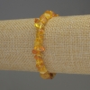 Bracelet with amber chips, 6–10×3–5 mm, length 18 mm, elastic stretch base