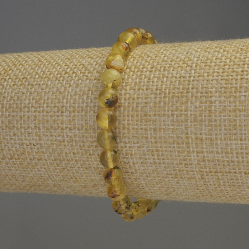 Amber bracelet with smooth beads, 6-6.5 mm diameter, 18 mm length, stretch