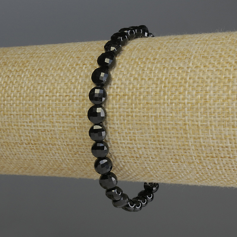 Black tourmaline bracelet with faceted coin beads, 6x4 mm diameter, stretch length 18 cm