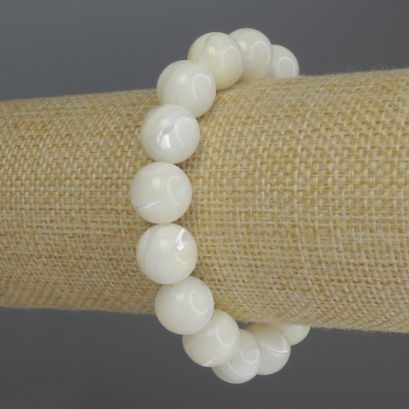 Mother-of-pearl bracelet with a smooth bead, 12 mm diameter, 18 cm stretch