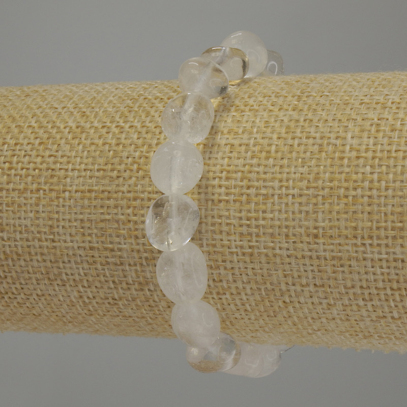 Bracelet with rock crystal, faceted, diameter 9-14x10 mm +-, length 18 cm stretch