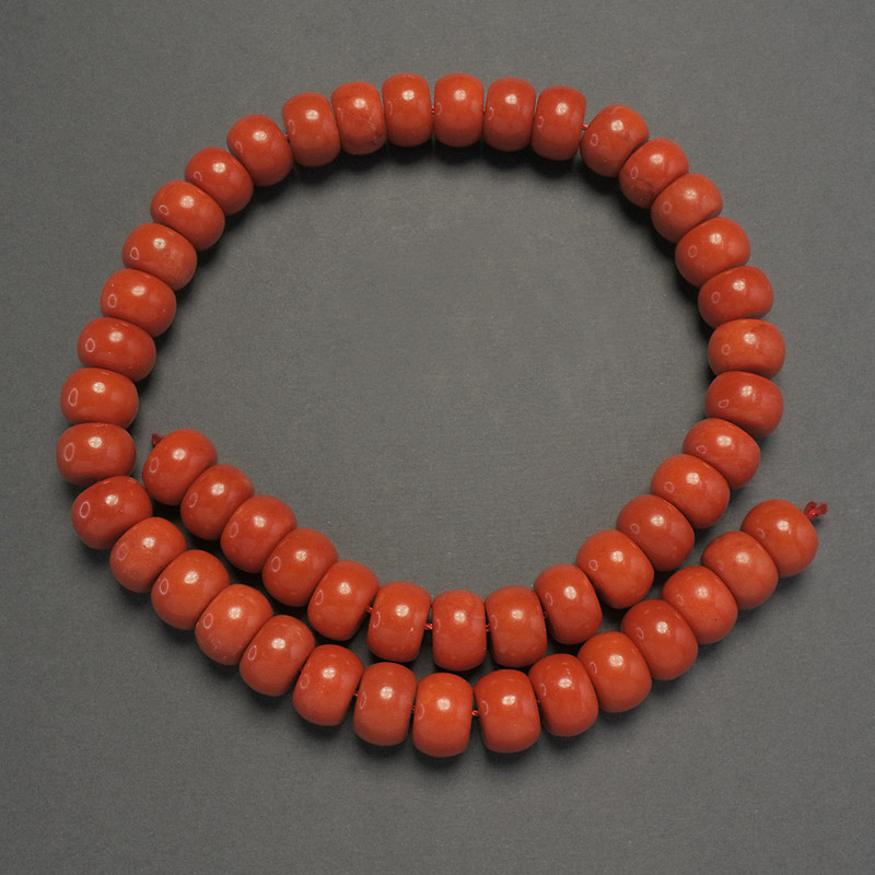Beads of artificial coral, smooth rondelle shape, diameter 12x8 mm, length about 40 cm on thread