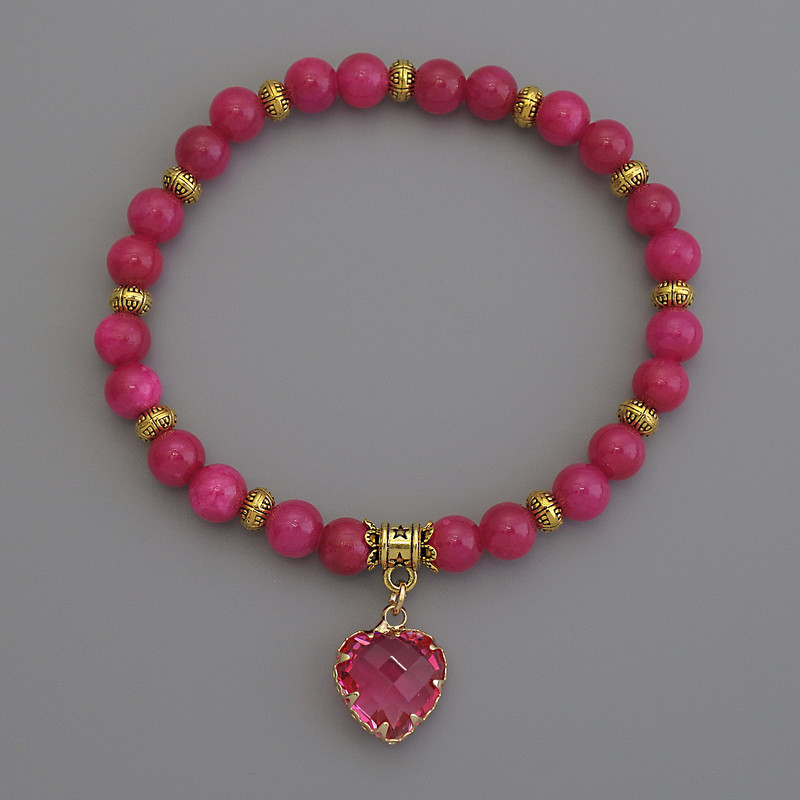 Raspberry acrylic bracelet with smooth beads, 6 mm diameter +/- with metal inserts, length 18 cm+