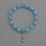 Bracelet with Czech crystal rondelles, diameters 8x6 mm and 6x5 mm, with metal inserts, 18 cm stretch
