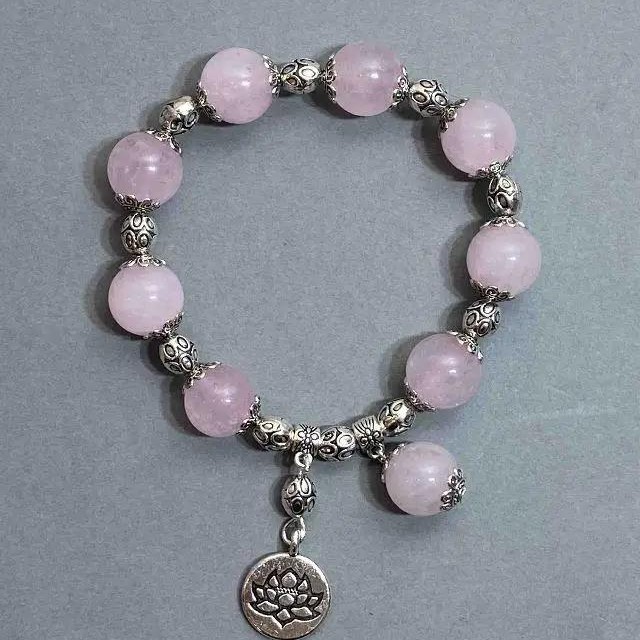 Bracelet with Rose Quartz Beads, diameter 12 mm ±, with metal inserts, length 18 mm ± stretch