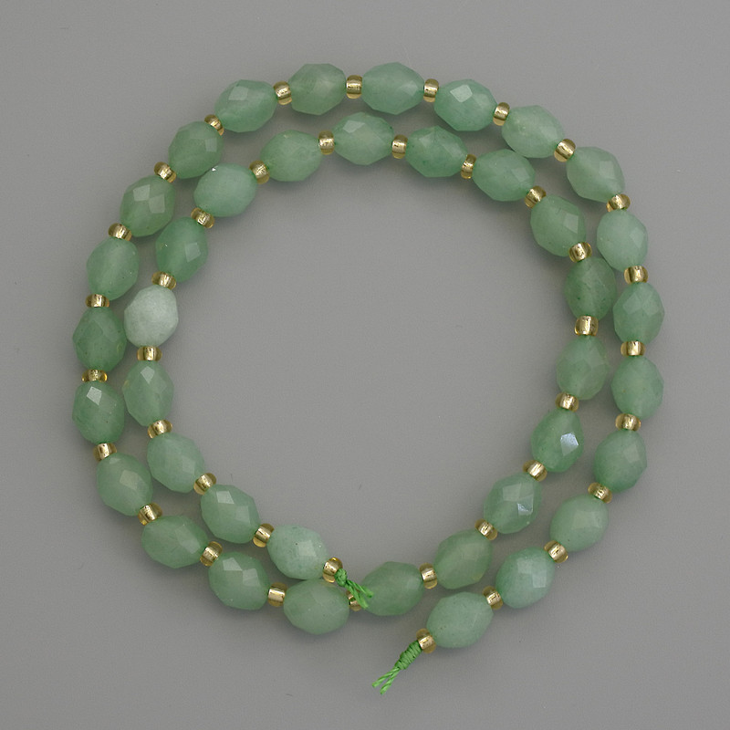 Beads of natural nephrite - faceted grain beads, 8×6 mm diameter (+/-) with 3 mm seed beads (+/-), length 39 cm (+/-)