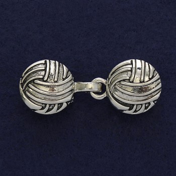 Cardigan clasp brooch in silver-colored metal, diameter 20 mm ±, length 52 mm ±