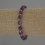 Amethyst bracelet with faceted grain beads, diameter 8x6 mm ±, with 3 mm seed beads ±, length 18 cm stretch