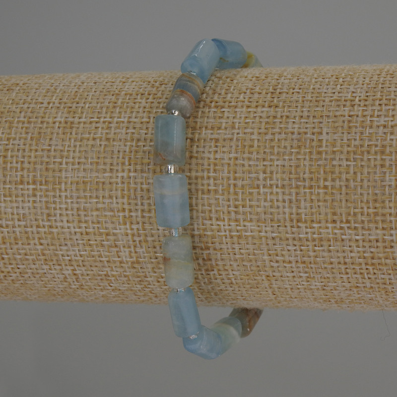 Blue Calcite Bracelet — Cylindrical Beads, 10×6 mm diameter ±, 3 mm seed beads ±, length 18 mm ±, elastic