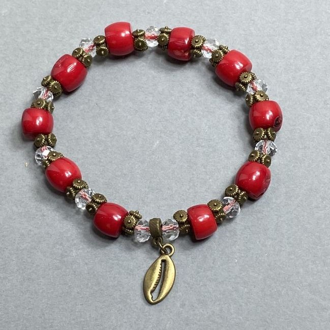Bracelet with Coral Cut Beads 7×9 mm; Czech Crystal Rondelle 6×5 mm; with Metal Inserts, Length 18 mm; Stretch