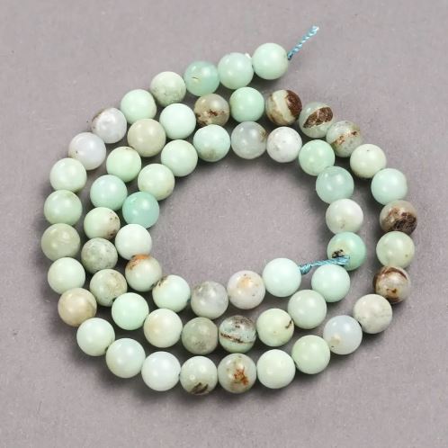 Chrysoprase beads on a cord — smooth round beads, 6 mm diameter, length 39 cm